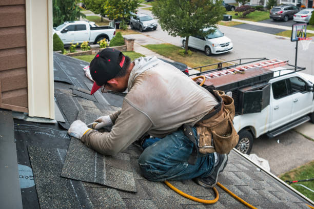 Professional Roofing technician working in Hankins, NY